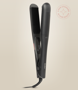Astral Black Omnia Styler Max upright and open, with its plate and temperature controls visible.