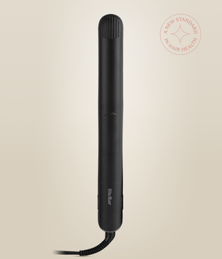 Front view of the closed Astral Black Omnia Styler Classic, with Stellar logo and cord.