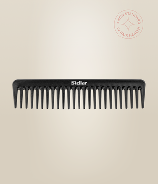 Black Carbon Dressing Comb shown horizontally, with wide teeth and a white Stellar logo.
