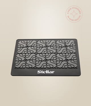 Black rectangular Stellar heat mat with a raised repeating S pattern and white logo.