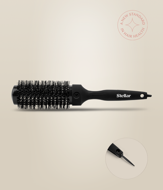 Side view of a black HeatSense Round Brush, with an inset showing the extended sectioning pin.