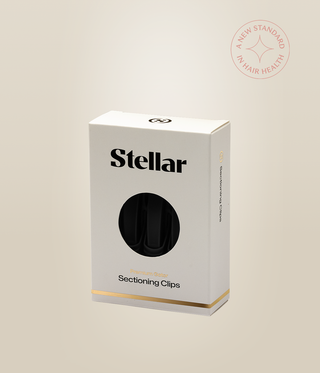 White Stellar Sectioning Clips box with a round window and gold trim.